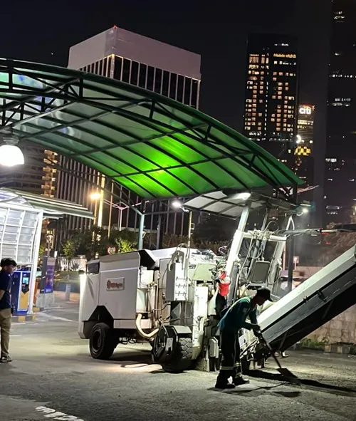 proses penghamparan aspal hotmix