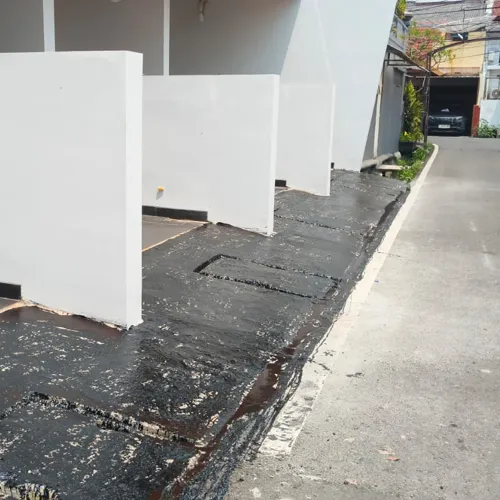 proyek pengaspalan jalan oleh kontraktor aspal berpengalaman